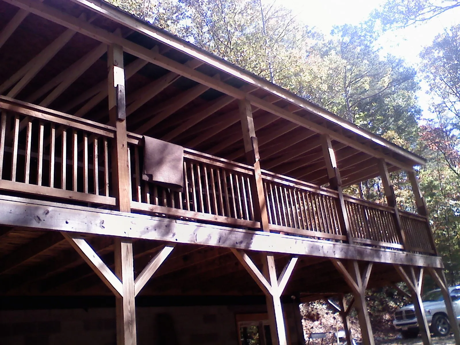 Timber framing under a new elevated porch and deck — Roof Leak Repair in Plumerville by Roofing Brothers